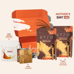 RYZE product set with packaging, coffee, and accessories on a white background